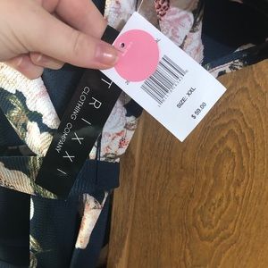 Trixxi Clothing Company Navy floral jumpsuit